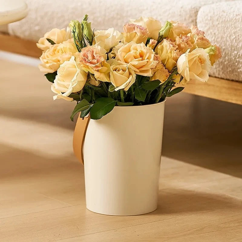 Beige Acrylic Cylinder Vase with roses inside