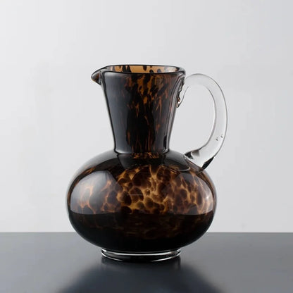 Medium sized Black and Brown Vase on a gray surface