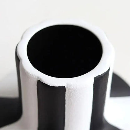 Close up of the opening of a Black and White Vase