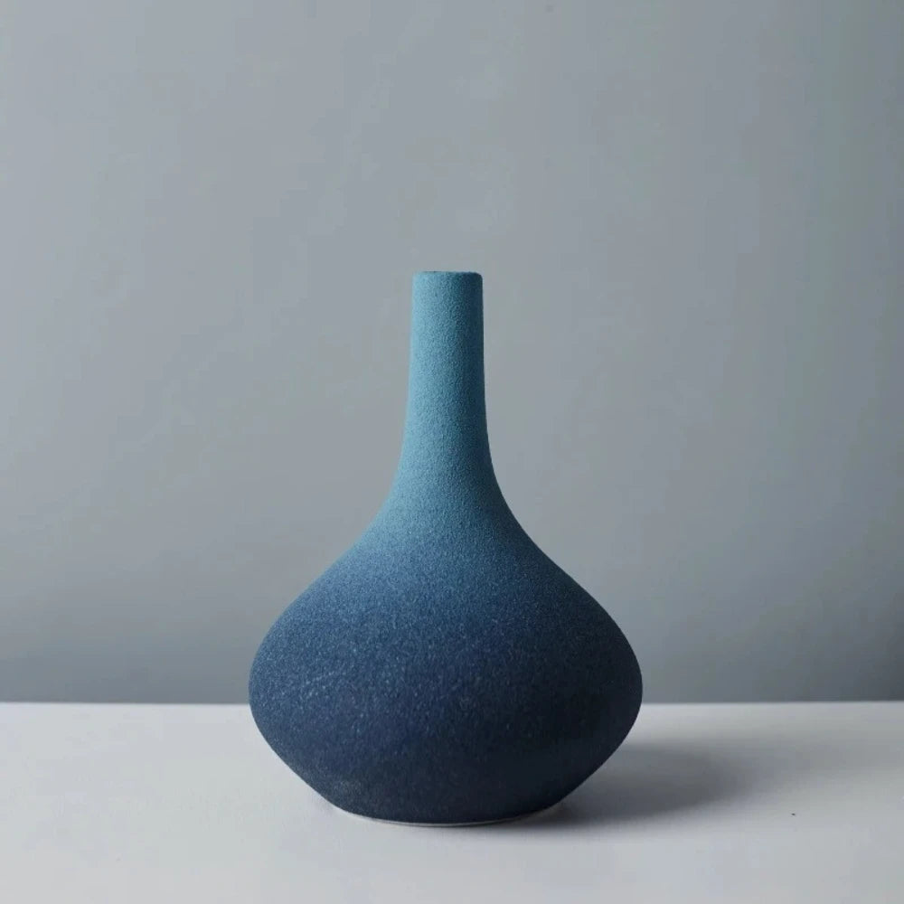 Blue Ceramic Vase on a white surface