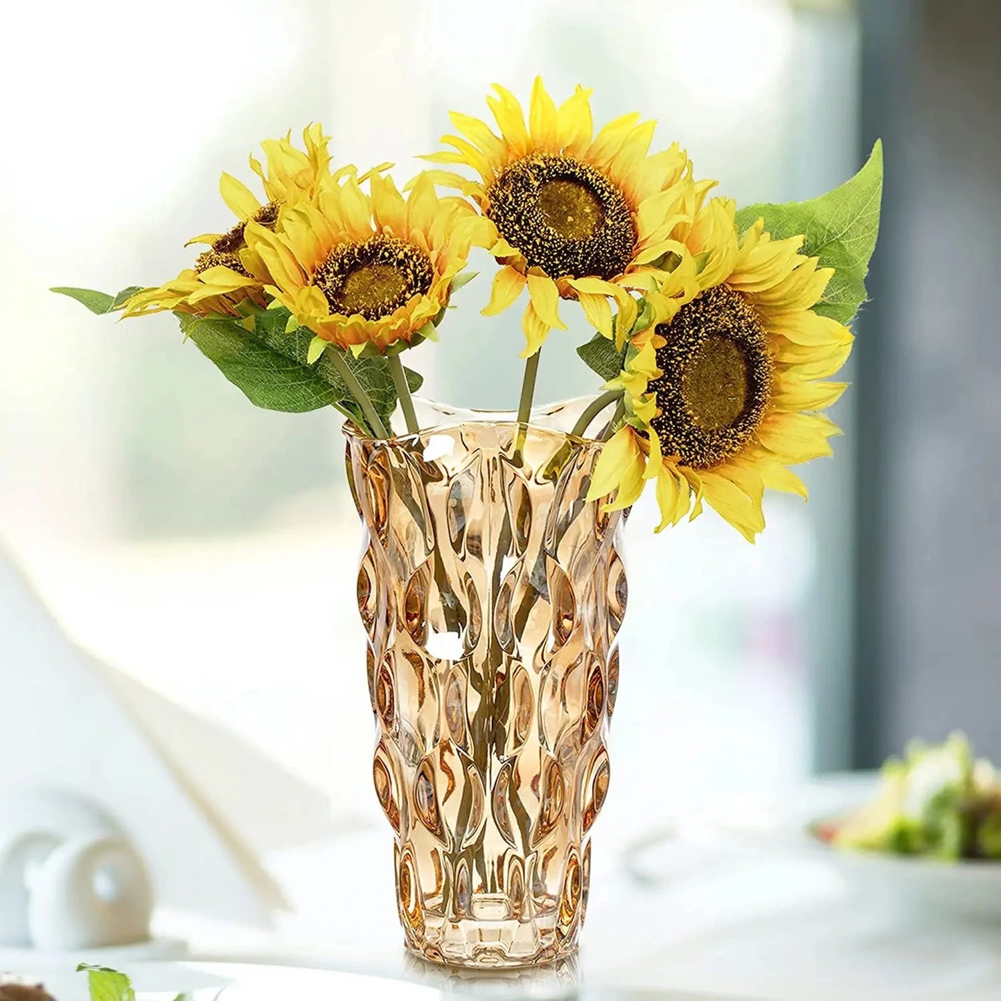 Bohemia Crystal Vase with sunflowers inside on a white surface