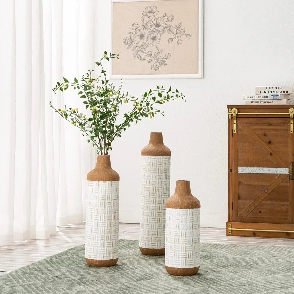 Boho Floor Vases with green plants inside on a gray carpet