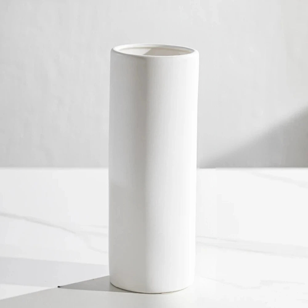 Ceramic Cylinder Vase on a white marble surface