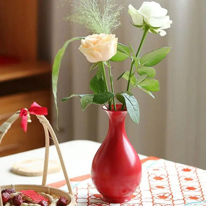 Chinese Red Vase With Roses Inside