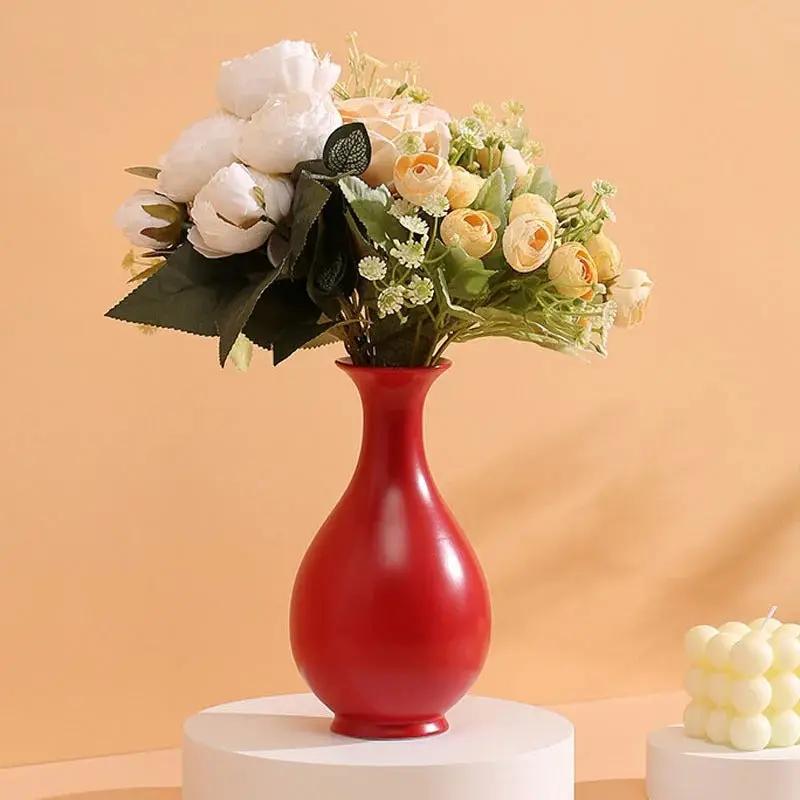 Chinese Red Vase With Flowers Inside