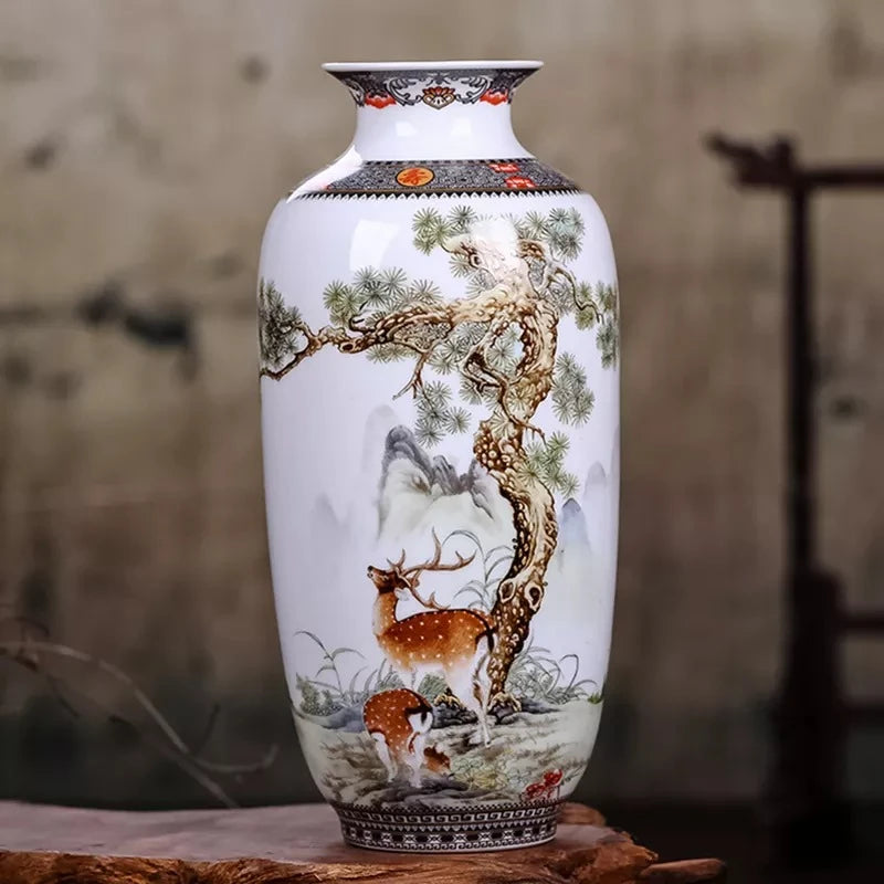 Chinese Vase with a deer motif on it standing on a piece of wood