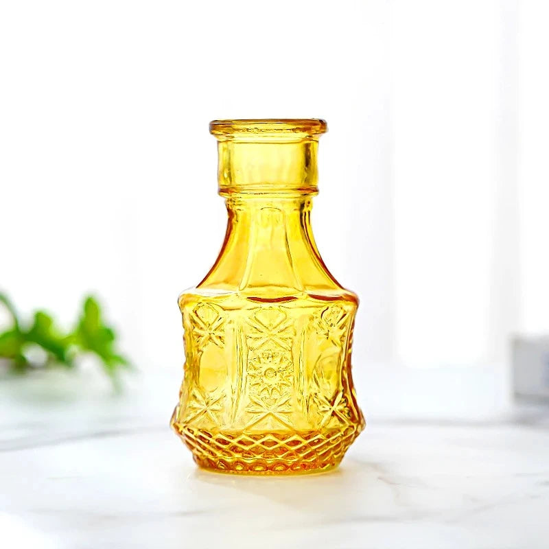 Crystal Small Vase in Yellow on a white surface