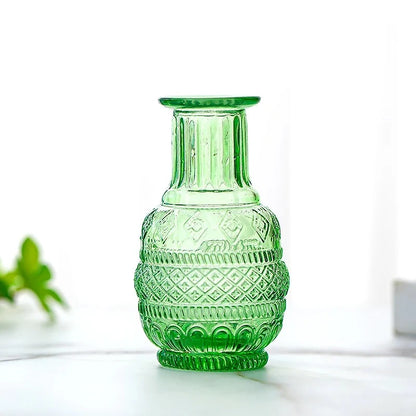 Crystal Small Vase in green on a white surface