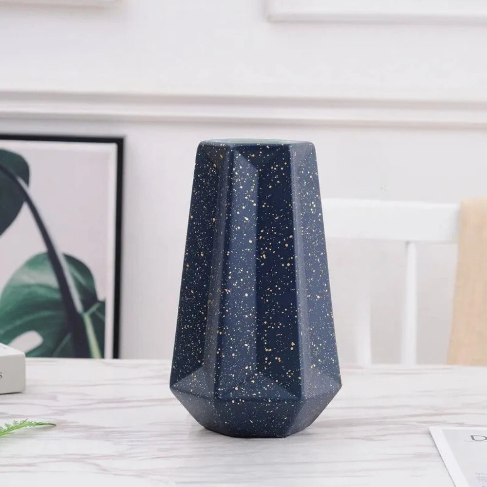 Medium sized Dark Blue Vase on a marble white table