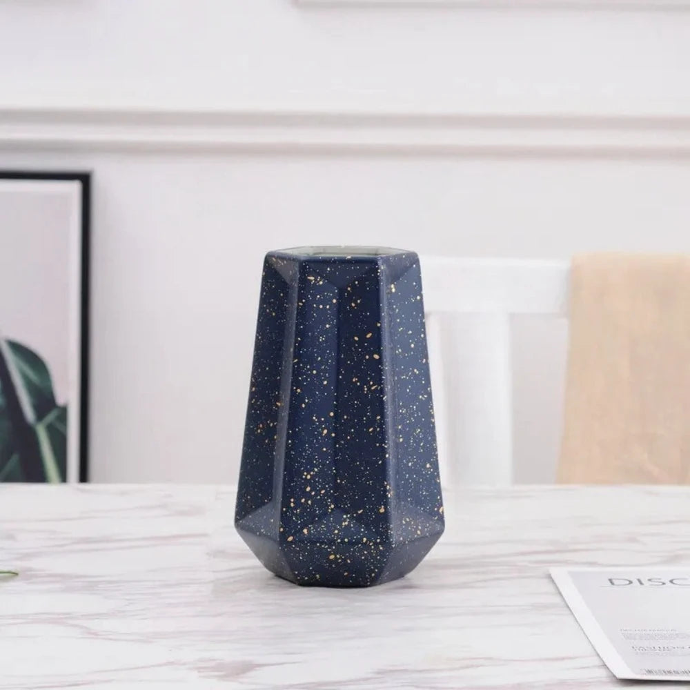 Small Dark Blue Vase on a marble table