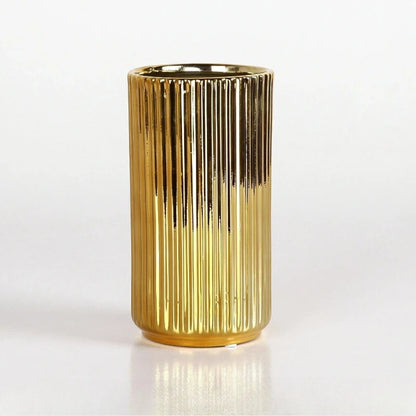 medium Cylinder Gold Vase on a white surface