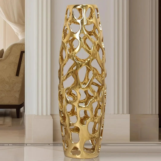 Gold Floor Vase on a beige surface