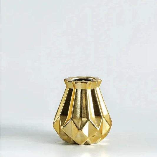 Small Gold Flower Vase on a white surface