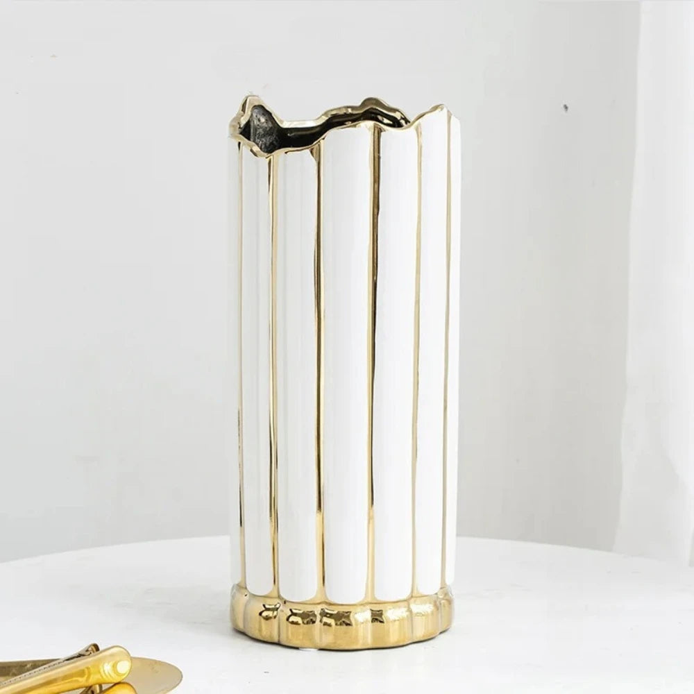 Large Gold and White Vase on a white surface