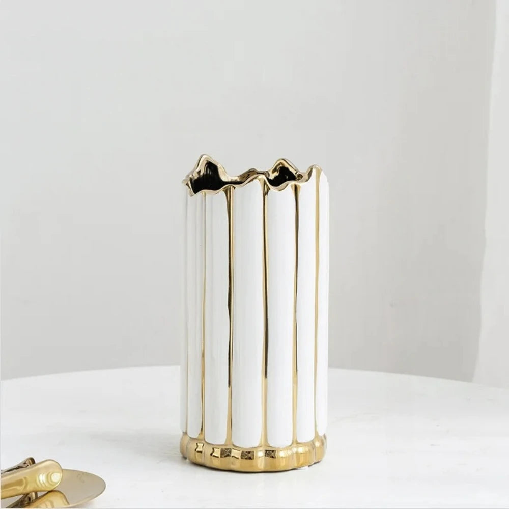 Gold and White Vase on a white surface