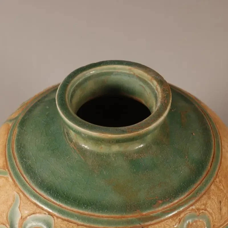 Opening of a Green Brown Vase