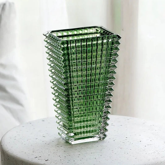 Green Crystal Vase on a white table