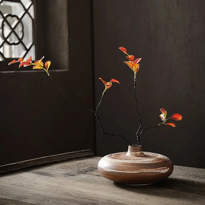 Japanese Vase in milky brown on a wooden table