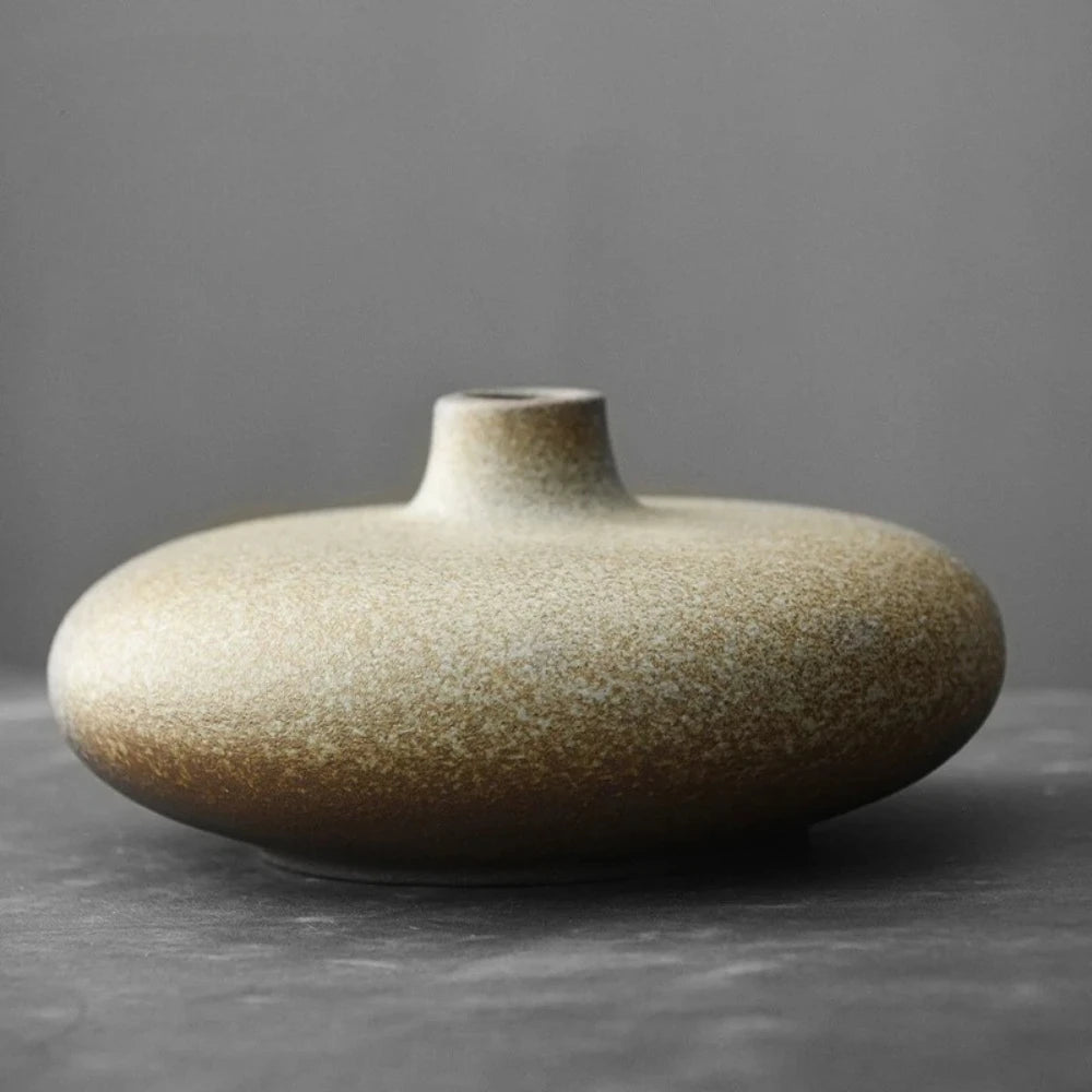 Japanese Vase in marble white on a gray surface