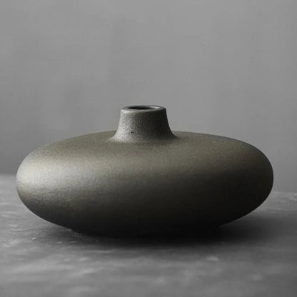 Japanese Vase in elegant black on a gray surface