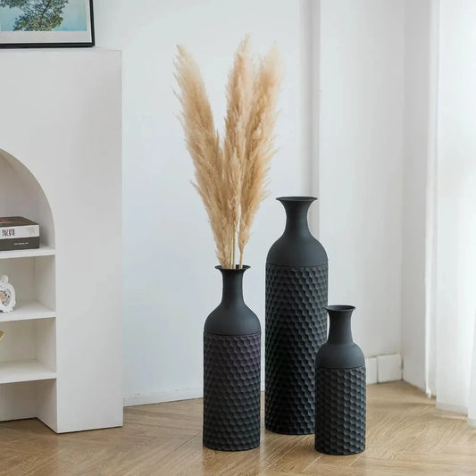 Large Black Vase set on a wooden floor