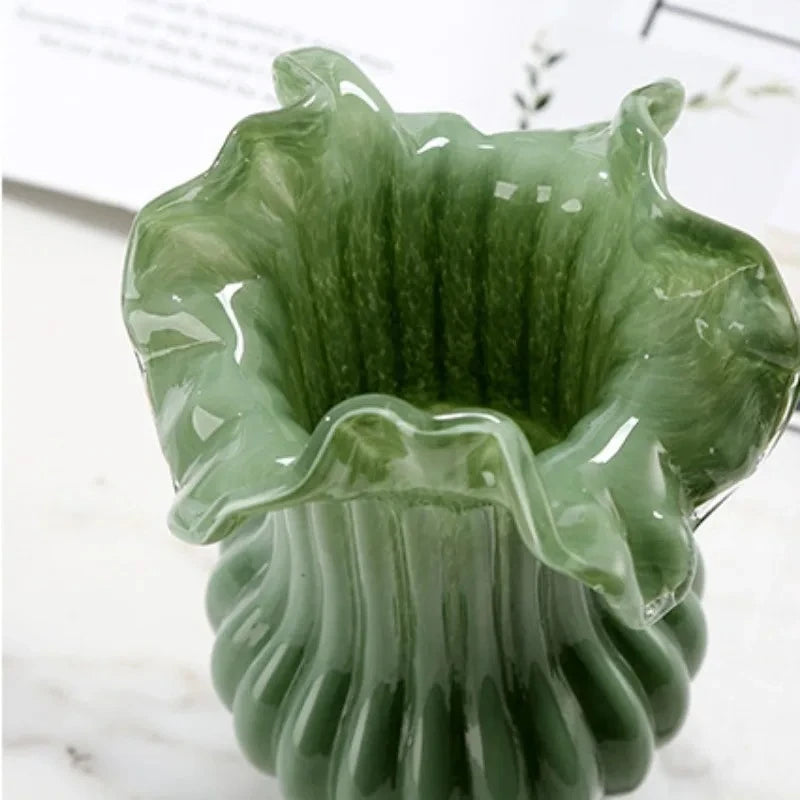 Opening of a green Milk Glass Bud Vase