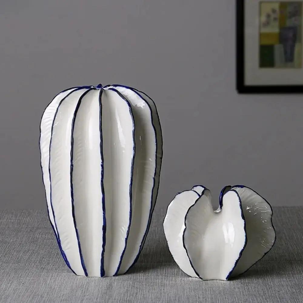 Two Milk White Vases in Medium and Large on a gray background