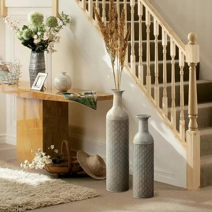 Modern Floor Vases next to a staircase with decoration inside