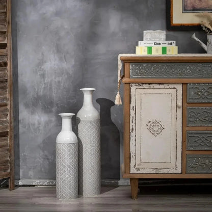 Modern Floor Vase next to a dresser with decoration on it