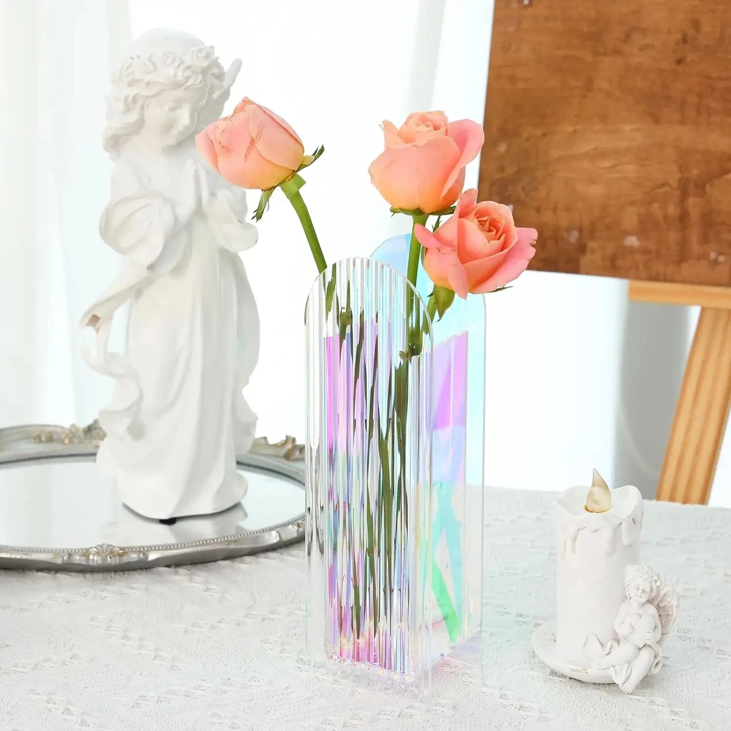 Plastic Vase on a white surface next to decoration