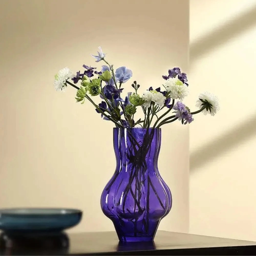 Purple Bud Vase with purple flowers inside