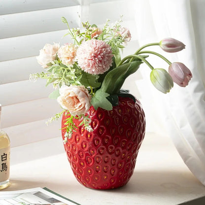 Red Ceramic Vase on a white window front 