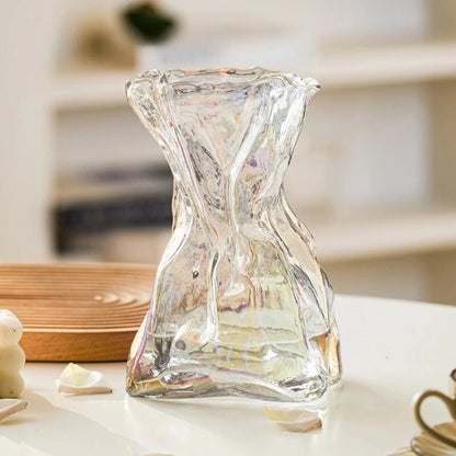 Rose Vase on a white table next to decoration