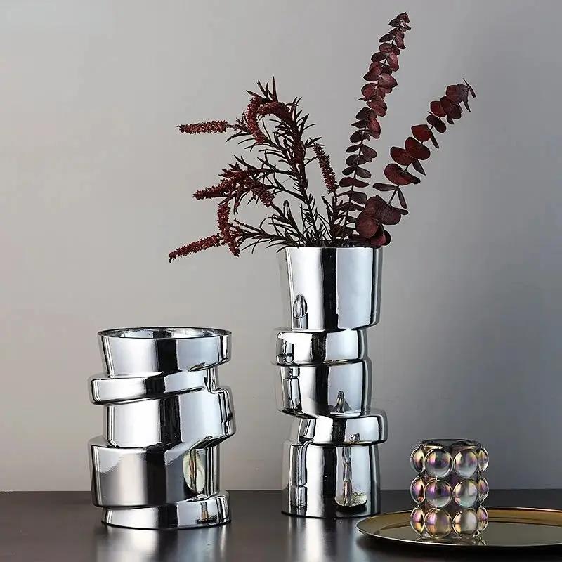 Two Silver Bud Vases in Medium and Large