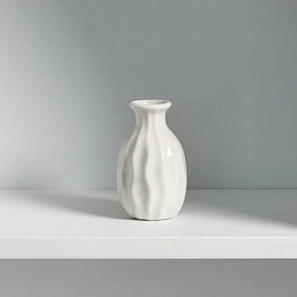 White Small Vase on a white surface