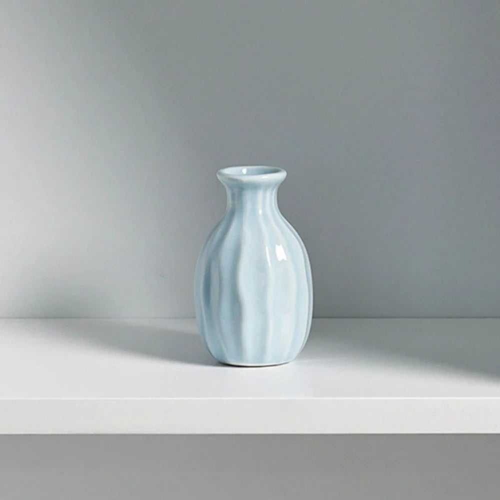 Blue Small Vase on a white surface