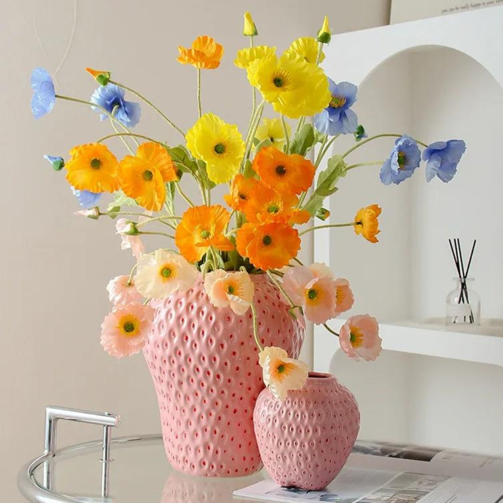 Large and Small Strawberry Vase Pink On A Glass Table