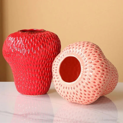 Two Strawberry Vase on a marble table