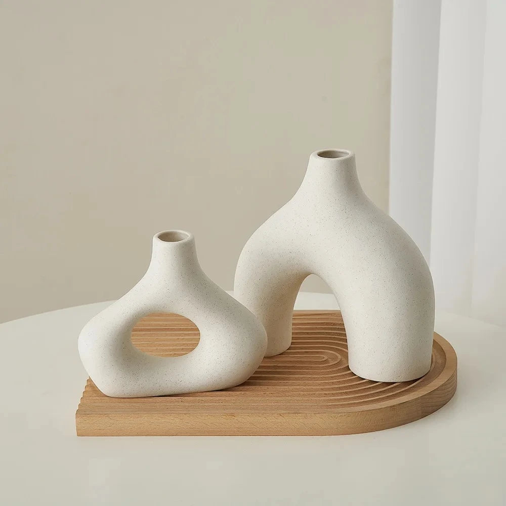 Two White Round Vases on a wooden tray 