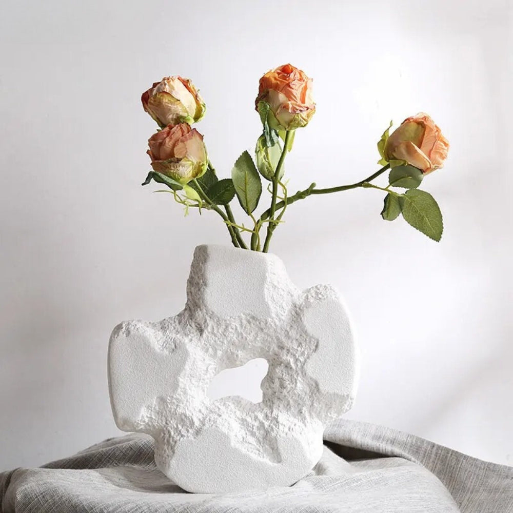 White Stone Vase With Roses Inside