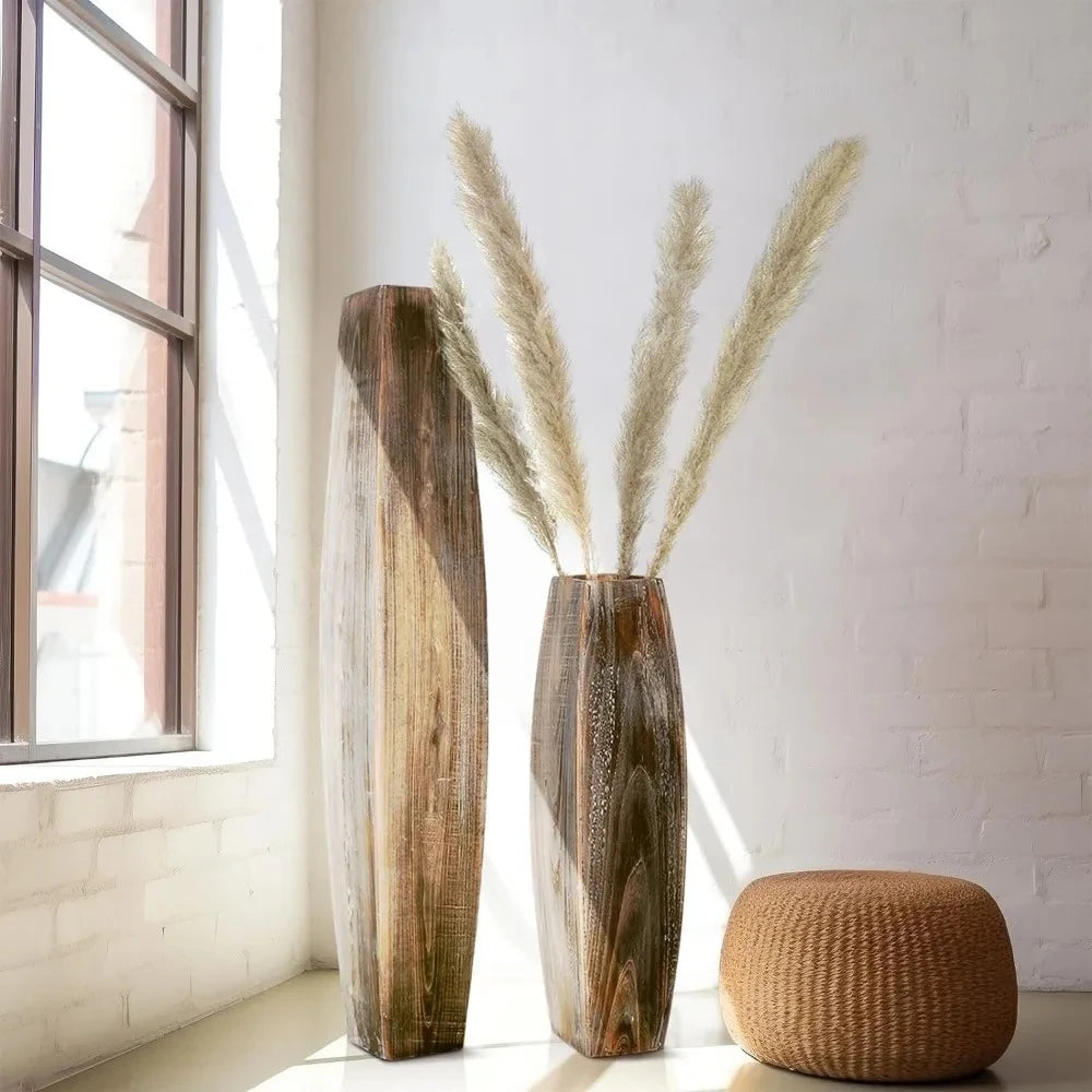 Two Wood Floor Vases on a white room next to a stool